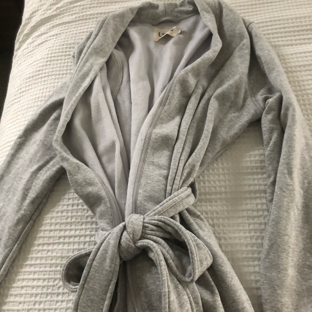 Women’s UGG robe. Size Medium. Length to above the knee. Brand new with tags
